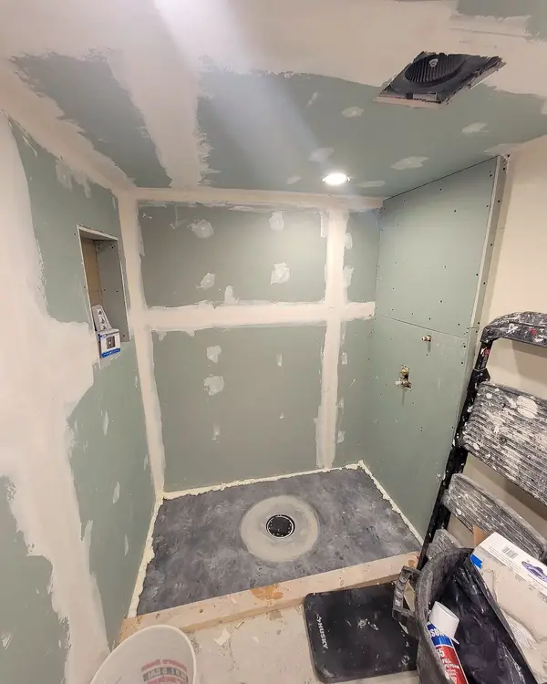 Stage 2: the shower floor sloped to the drain
